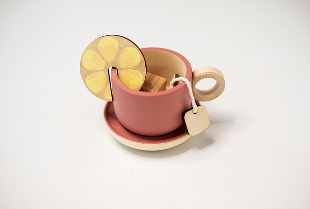 mixed Japanese tableware set with medium plates textured bowls and mugs in earthy tones on wooden dining table