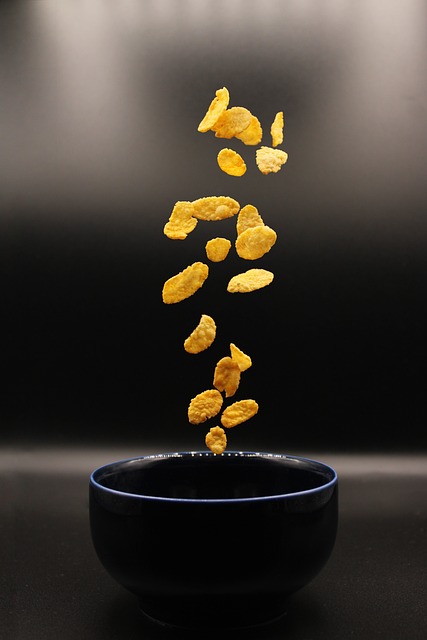 Japanese mug with earthy glaze beside small plate and bowl creating simple Japandi tableware set